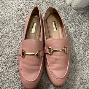 Comfy pink faux leather loafers with buckle detail